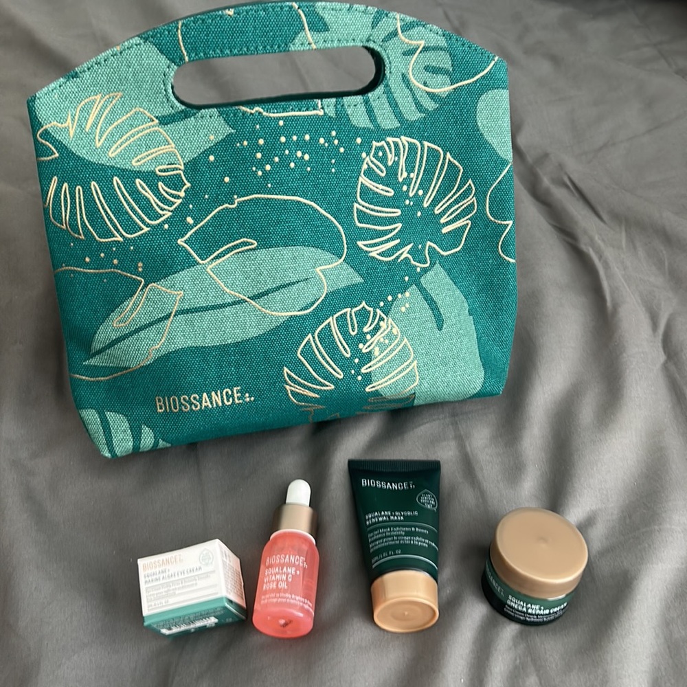 New Biossance clutch and skincare products